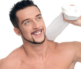 Young man with white towel